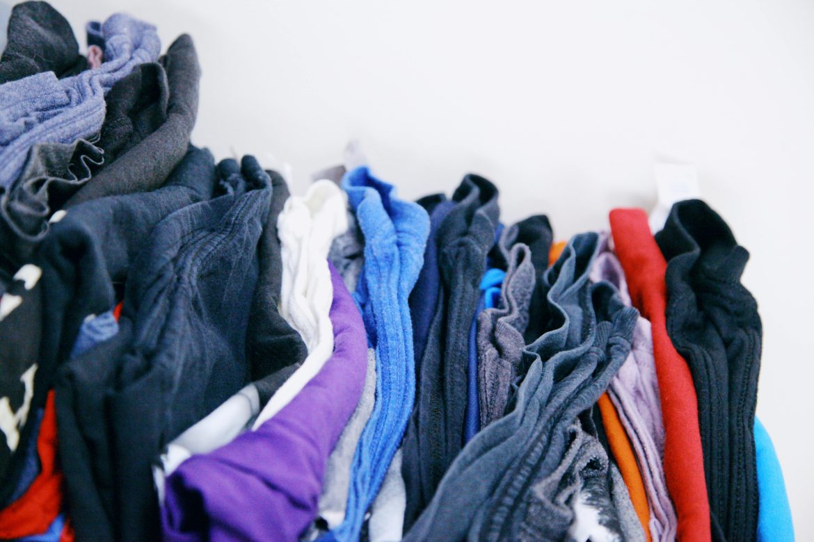 a lot of colorful used clothes